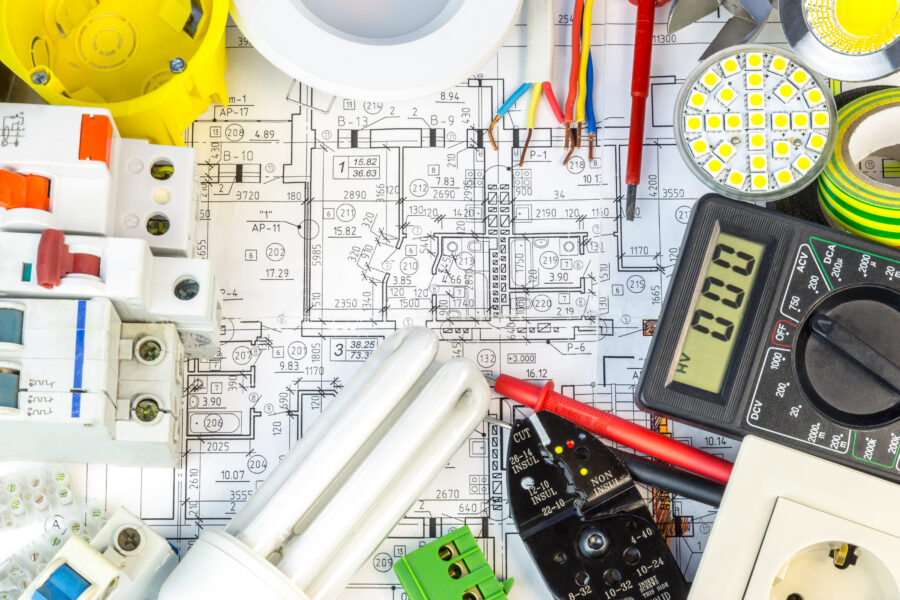 Still Life Of Electrical Components Arranged On Plans